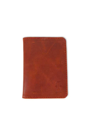 Red brick Leather Passport holder. inside features two open pockets and two card slots- made by AWRE ART & DESIGN in houston, Texas, US.