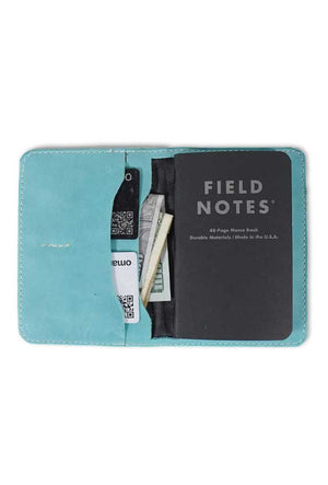 Mint blue Leather Passport holder. inside features two open pockets and two card slots- made by AWRE ART & DESIGN in houston, Texas, US.