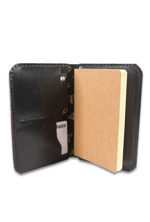 Slick Black Leather Passport holder. inside features two open pockets and two card slots- made by AWRE ART & DESIGN in houston, Texas, US.